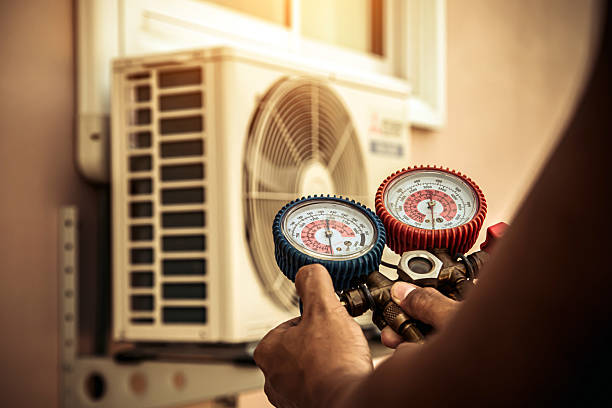 Professional Hvac Maintenance technician working in Doss, TX
